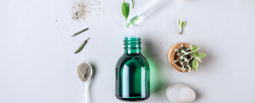 Huiles essentielles flacon plante brosse blanc